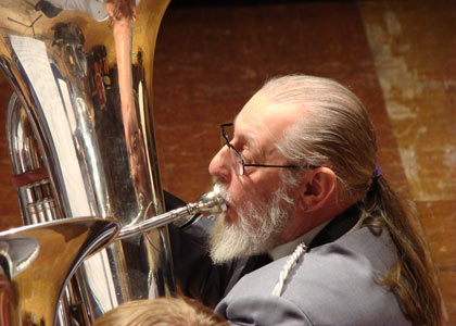 bass player with pony tail