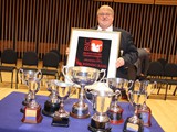 Austin Davies with trophies 